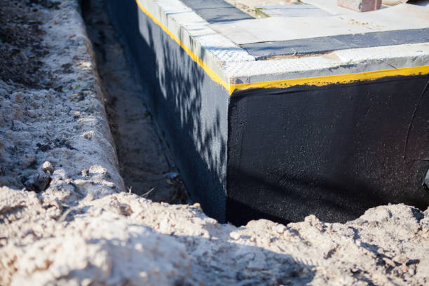 Professional Emergency Waterproofing technician working in Beverly Shores, IN